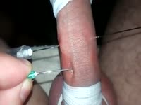 Bored guy punishes his own enlarged cock with needles in this insane bdsm fetish movie